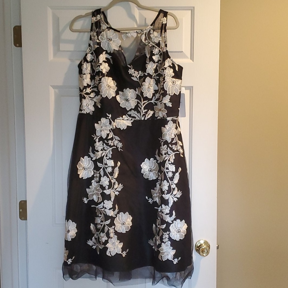 Black and cream mid length dress